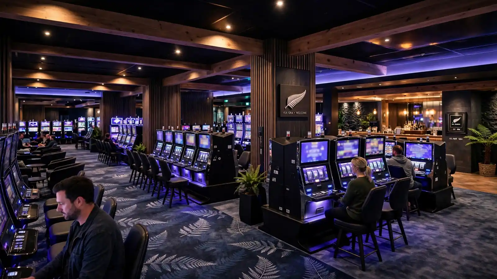 Modern New Zealand casino floor with rows of illuminated slot machines and ambient lighting in 2026